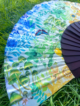 Load image into Gallery viewer, Colourful Silk folding hand fan &#39;kaleido-bloom&#39; print with floral &amp; nature filled rainbow design