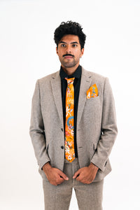 Rust orange coloured Silk Tie, 'Eden' tropical meadow print