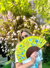 Load image into Gallery viewer, Bright yellow  &#39;Luciferin&#39; silk folding hand fan with flowers and mushroom painted artwork