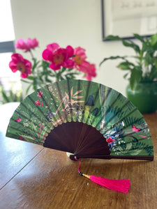 Green hand-held silk fan with 'Greenery' mushroom and crystal botanical artwork