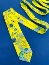 Load image into Gallery viewer, Vibrant yellow and pale blue ‘Luciferin’ floral silk tie