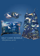 Load image into Gallery viewer, Luxury self-care gift bundle: Blue silk pyjama set, pillowcase and eye mask in &#39;Wonderous&#39; Print