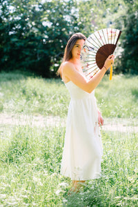 Floral Silk Fan with Toucan design and luxurious Gold tassel, part of the Mysa Collection