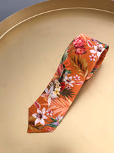Load image into Gallery viewer, Rust orange coloured Silk Tie, &#39;Eden&#39; tropical meadow print