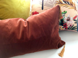 Velvet Cushion 'Flow' in Rust colour with gold tassels, rectangular shape and feather filling